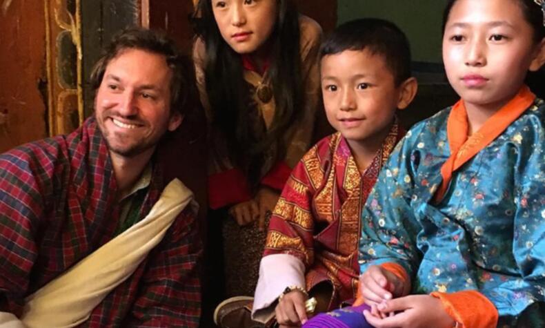 Matt with a local family