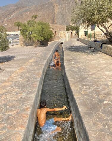 At the foot of Jebel Ahkdar, the town of Birkat Al Mouz has a water channeling system that is a UNESCO heritage site. remote luxury travel Oman Birkat Al Mouzv Oman luxury desert