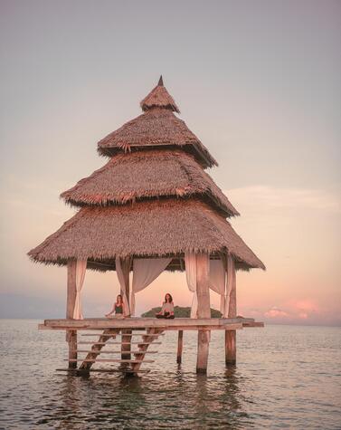 At the Nay Palad resort we can practice yoga on the sea. Travel luxury remote luxury sustainability islands beaches siargao philippines nay palad.