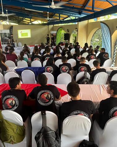 Students participate in this regenerative tourism. Students at the annual macaw count