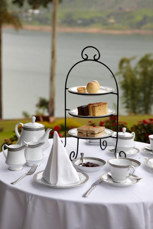 The relaxing and sweet 5 p.m. tea ceremony in front of Castlereagh Lake. luxury travel sri lanka tea plantations Sri Lanka Tea