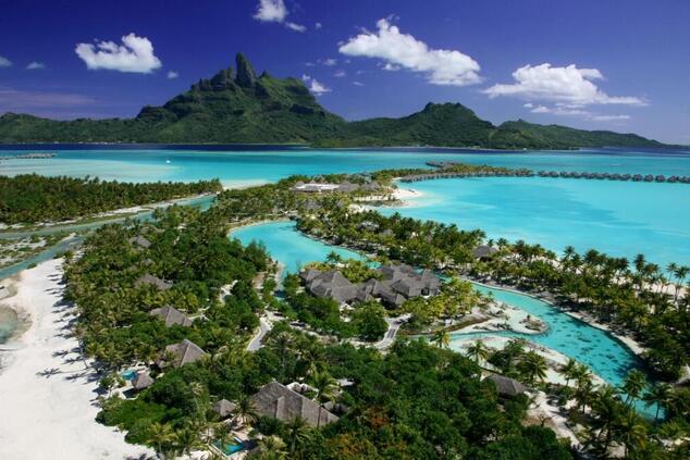 In the center of Bora Bora, the Otemanu is an extinct volcano of 727 meters (2,727 feet). luxury travel remote islands polynesia bora bora otemanu