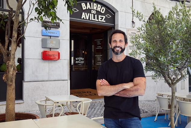 Chef José Avillez in front of his restaurant "Bairro do Avillez". chef jose avillez portugal