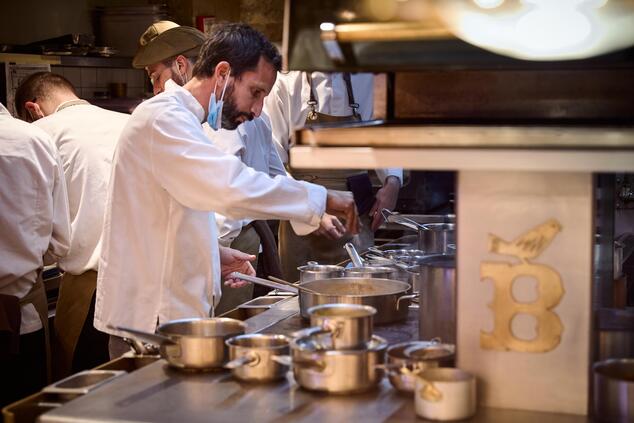 José Avillez working in the kitchen of Belcanto, Portugal's only two-Michelin-starred restaurant. chef jose avillez portugal belcanto lisboa