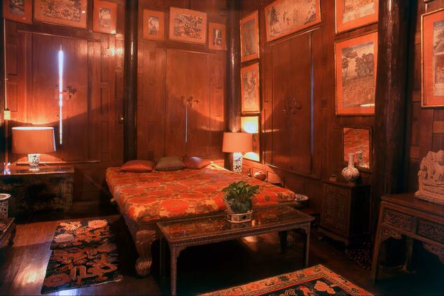 Traditional Thai paintings on display at the Jim Thompson House Museum.