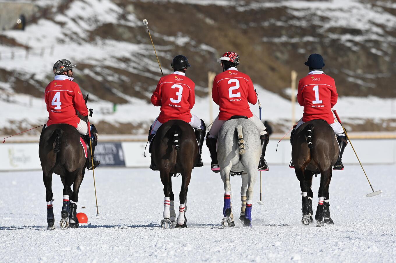 A polo team is composed of four players. They can be mixed, with men and women. The owner of the team is usually one of the players. Cartier snow polo players St. Moritz snow polo